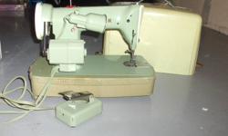 400$ OBO
Green Singer Sewing Machine in good condition - comes with case