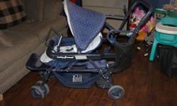 Baby Trend Sit and Stand stroller for sale.  Sturdy construction and in great condition.  A little fading on fabric but no other defects.  Comes with a universal infant carrier attachment bar so it will fit all infant carriers.  Stored inside and from a
