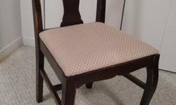 Solid oak chairs with medium-dark oak original finish. Queen Anne style with arch back. Likely made in Ontario in 1920s or 1930s, and have been in regular use in my dining rooms for over 40 years.. Seats are removeable and currently have light pink