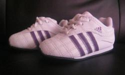 I have a pair of purple Adidas size 4 shoes. Just bought daughter didn't fit them. Asking 25.