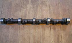 This camshaft is for small block chevrolet V8s and is new and has never been run but was installed in an engine, it's about 20 years old and the Competition Cams grind number is 310S8, intake valve lift is .555 and the exhaust lift is .531. There is no