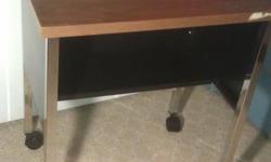Measures 24 x 18 x 28". Great desk with strong metal frame and storage underneith. Pickup in kanata. check out my other ads too.