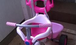 SmarTrike (Adult-Steerable Tricycle)
3-point harness, canopy/visor, storage bucket, and an adult steering-handle for toddlers unable to pedal.
Grows with your child and transforms to a tricycle.
No dings, scratches. Impeccable condition. Retails for