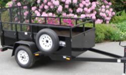 STEEL UTILITY TRAILER WITH 3500 LB AXLE, 15" TIRES, REAR RAMP GATE, 22" SIDES WITH 10" RAILING ABOVE, TARP HOOKS, PLANK DECKING, 4' TONGUE WITH FRONT JACK, SAFETY CHAINS AND LIGHTS. EMPTY WEIGHT IS 900 LBS. WITH A PAYLOAD OF 2090 LBS. COMES WITH A SPARE