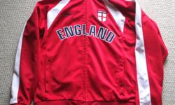For Sale :England Jacket by Umbro. (Red and white trim))
Full front Zipper to neck - 2 front zippered pockets
Size: Medium
Mint condition.. $15.