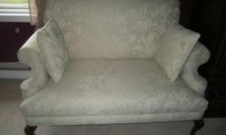 Sofa - 2 seater, cream color with pattern, 2 pillows included. Excellent condition! Call 705-522-3167