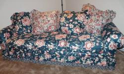 Floral sofa with cushions and 2 pale green platform rockers. Good value and condition. $250 for all. No partial offers please.