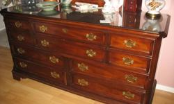 Solid Cherry wood.  All pieces have glass protector tops.  Excellent condition, beautiful  furniture. $500.00.  Please call 250-418-8902