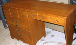 Solid maple desk for sale,quality construction as the top is pegged and where your hand sits to write has been concaved so you will not have that mark on your arm from the edge of the wood. A few marks as you can see by the pictures but still a beautiful