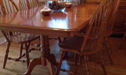 Wood: Solid Maple
Size: 66" X 42"
Plus 2 Leaves, approx. 14" ea., 4 chairs
Crank mechanism effortlessly opens and closes table to add Leaves. Pick up is in Orleans.