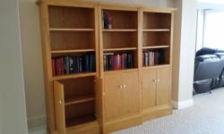 Three oak bookcases, excellent condition, sold as set only. Does not include the books.
Dimensions: 74.5 inches tall; 86 inches wide (all three together)