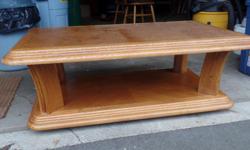 Beautiful solid oak coffee table on casters.
49"L x 30"W x 18"H . Excellent condition.
Cost over $500