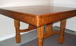 For Sale: Refinished  solid oak antique dining room table. The table apron and legs have unique carvings. Table measures 48 inches by 48 inches.  Three leaves allow for the table to be extended to 72 inches. Will deliver. Phone 902 436 5489
