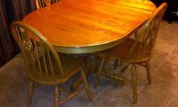 Solid Oak - dining room table and 4 Chairs
 
table is a 40" in diameter without extension.