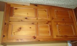 Solid Pine armoire for sale-- Will accomodate 32" TV. Great condition