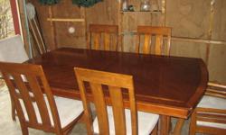 I am selling a solid wood dining room table with 6 chairs, 2 with arms and all 6 with microfiber seating, along with 2 leafs to expand out the set longer to seat up to 10-12 people as well as an optional matching buffet if you need it too. I took plenty