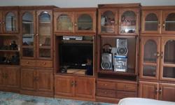 Well cared for oak wall units, with shelves, glass doors, wood doors. Loads of attractive storage! These are solid wood construction, not particle board. Bought from The Brick only a few years ago. Priced by Individual unit at $50.00 per piece.
Will need