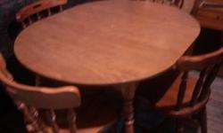 MEDIUM STAIN OAK WITH ONE LEAF AND FOUR SOLID OAK CHAIRS-EXCELLENT CONDITION