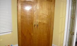 Solid Wood Wardrobe, in very good condition, minor scratch on the front, can easily be touched up,125$