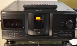 NEAR MINT
COMES COMPLETE WITH ORIGINAL SONY REMOTE CONTROL
SERVICED, LASER LENS CLEANED, MECHANISM LUBED
WORKS GREAT !
The Sony CDP-CX235 is a 200-disc player, it's a CD Changer, a Jukebox, an organizer all packed in one package.
CDP-CX235 comes with