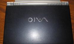 Sony VAIO laptop, 9 inches.
1.5 gb of memory
There is some wearing around the keyboard and screen and a slight marking in the screen when turned on (shown in picture) but you can see through it so it doesn't block anything on the screen. Works fine.
403