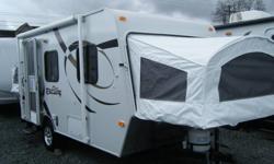 Super lite hybrid, by K-Z. Two year factory warranty! With air conditioner, stereo, microwave, and awning. Only 2410lbs dry weight! All the advantages of a much bigger trailer, without the added length! Can be towed by many minivans and smaller suv's.
