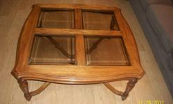 Square coffee table with four glass inserts for sale. E-mail or phone (weekends or after 7pm on weeknights).