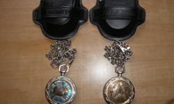 Set of two Star Trek Franklin Mint Pocket Watches.
 
These watches are in mint condition and rarely taken out of their leather cases. One watch is from the Original Series and the other is from the Next Generation.
 
Batteries need to be replaced.