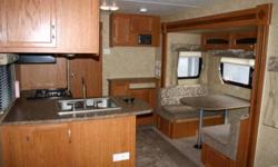 Looking for a new Travel Trailer? Save big. Our virtually new 2011 Starcraft Autumn Ridge 245DS Trailer with many extras and features available now. Private sale. No Pets, no kids, non smokers, never had a meal cooked in it. Immaculate condition inside