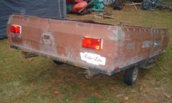 selling a box cargo trailer,has steel box but sides need reinforcing,has good tires,new wiring,bearings,17/8 tongue,very light for small cars.....$250.00OBO or trade for vintage muscule sled    705 429 7588