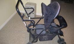 Three strolers for sale. 1 stroller is a double in great condition and the other stroller is made for 2 but is a sit or stand in the back with a regular seat in the front for a smaller child. The third stroller is a travel stroller. All three in good
