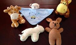 Five stuffed toys for babies.