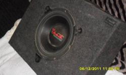 Neat subwoofer. Little is known about her, except she was working well when removed. Good for behind a seat. Put some thump in your trunk, for very little money. 30 dollars.