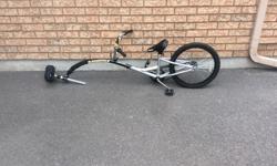 Tandem bicycle trailer with 20" wheel
Attaches easily to any full size bike
Comes with all hardware.
Designed to allow you and your child to ride together at the same pace.
Probably would fit most 3-10 year olds