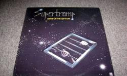 Supertramp Lp "Crime Of The Century". 1974
 
gatefold in NM condition & vinyl in NM condition.    
 
NM=near mint