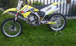hey i have a 2005 rmz 250 that i do not want to put another penny into becasue of recent engine problems last season. $1700 OBO takes the whatever is left, i have listed what is gone and what is still available.  the clutch and complete right side of the