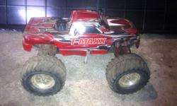 Truck is a t-maxx 3.3. I bought the truck for something to play with for a while because I'm a gear head. I haven't used it for a while now so I think its guna need a good home. Everything works wonderful never ever had a problem. I also have stock tires