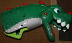 Spike t-rex grabber makes funny noises, and roars.  Made to put your hand inside and pull the grabber to make him chomp and light up (spikes). Comes with bone to pick up and instructions.  $6
 
Smoke free home.
More toys posted.