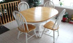 Maple top with 6 chairs in very good condition picture has leaf in it.