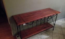 lovely wrought iron and wood table/wine rack, 50" long, 18" wide and 29" high