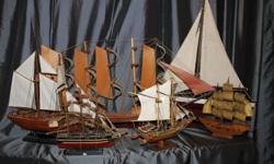 I have a collection of 6 tall ships, varying in size. I will sell separately, but prefer to sell the collection.
Pic 1 - the collection .... $200.00 obo
Pic 2 - on the stand - 18" high, 21" long......$30
Pic 3 - 12.5"h x 13"l - sails made from cows