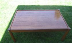 Freshly refinished (sanded and minwax teak oil) 1970's era teak table in great condition. 30" by 48", 20" high. Original owners.