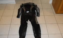 Used only 4 times, in new condition. Black/Grey. Top of the line riding suit looks great.