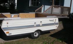 I have a former Flaggstaff tent trailer that I converted to a utility trailer.
All lights work and comes with spare tire.
I left the slide out base of the beds on as a cover but will remove if buyer prefers.
I think the original weight was 1100 lbs.; now