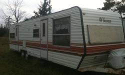 Trailer 33 feet long and is in great shape. Like brand new inside, no smells or leaks. Plumbing, hot water and stove all work. Tows very well, brakes work. Trailer queen bed in bedroom and two conversion beds in main area.