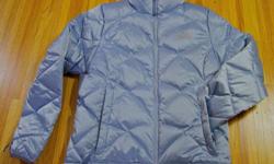 New, Never been worn. Women's Size Medium. Color: light blue. Water resistant nylon outer with Durable Water Repellent coating keeps the drizzle, snow and wind out. 550 fill Goose down insulation for toasty warmth on cold days. Brushed collar prevents