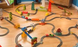 Plastic train tracks include some extras such as a tunnel, towers, and trains.
75 pieces!