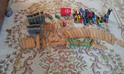 Just over 100 pieces in this train set, including:
2 electric Percy Trains
1 electric Edward Train
1 Rocky, 1 Hank
A bunch of magnetic connector trains
Water Tower
Suspension Bridge
Magnetic Cargo Crane
Hospital
Circular Ramp - can build a circular ramp