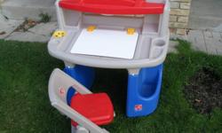 This sturdy table and creative play activities for children are very suitable. It has a large work surface molded compartments, plus a dry-erase wipe clean surface, writing easy, open to a storage area below. A raised shelf holds art supplies and has a