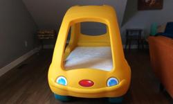 Toddler car bed with brand new crib sized mattress. In excellent condition